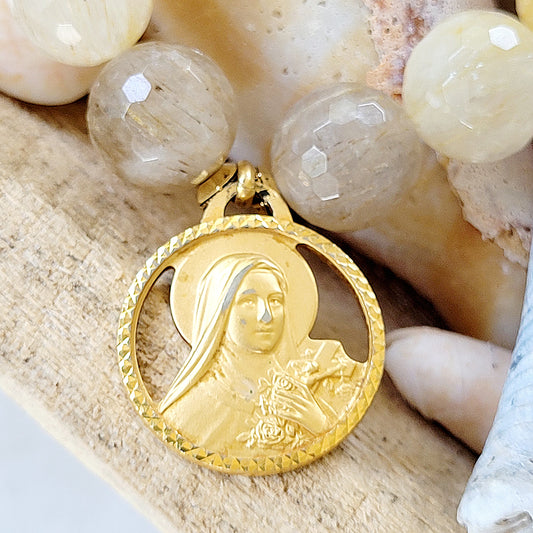 Rutilated Quartz Faceted 12mm Beaded Bracelet w/ Gold-Plated Medal of St. Therese of Lisieux