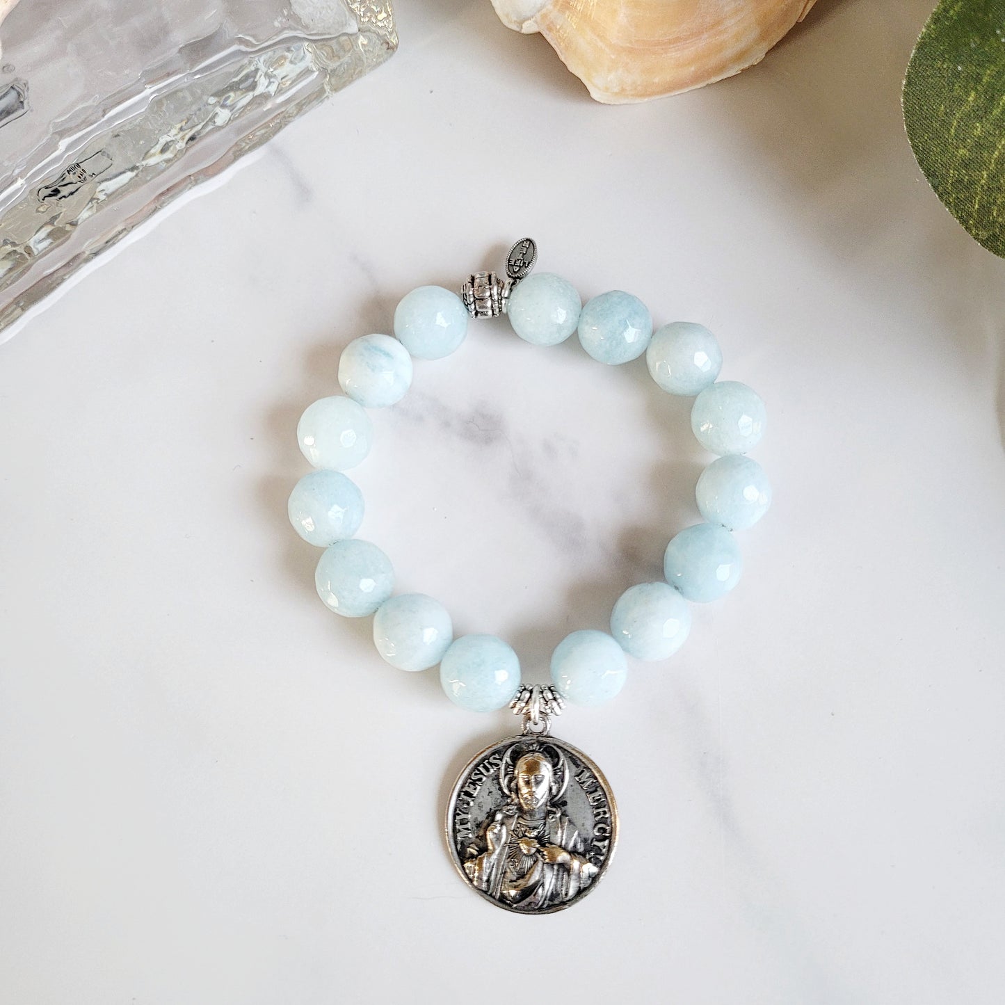 Aquamarine Faceted 12mm Beaded Bracelet w/ Large Deeply Embossed Medal of Jesus Mercy and Mary Pray for Us on the back