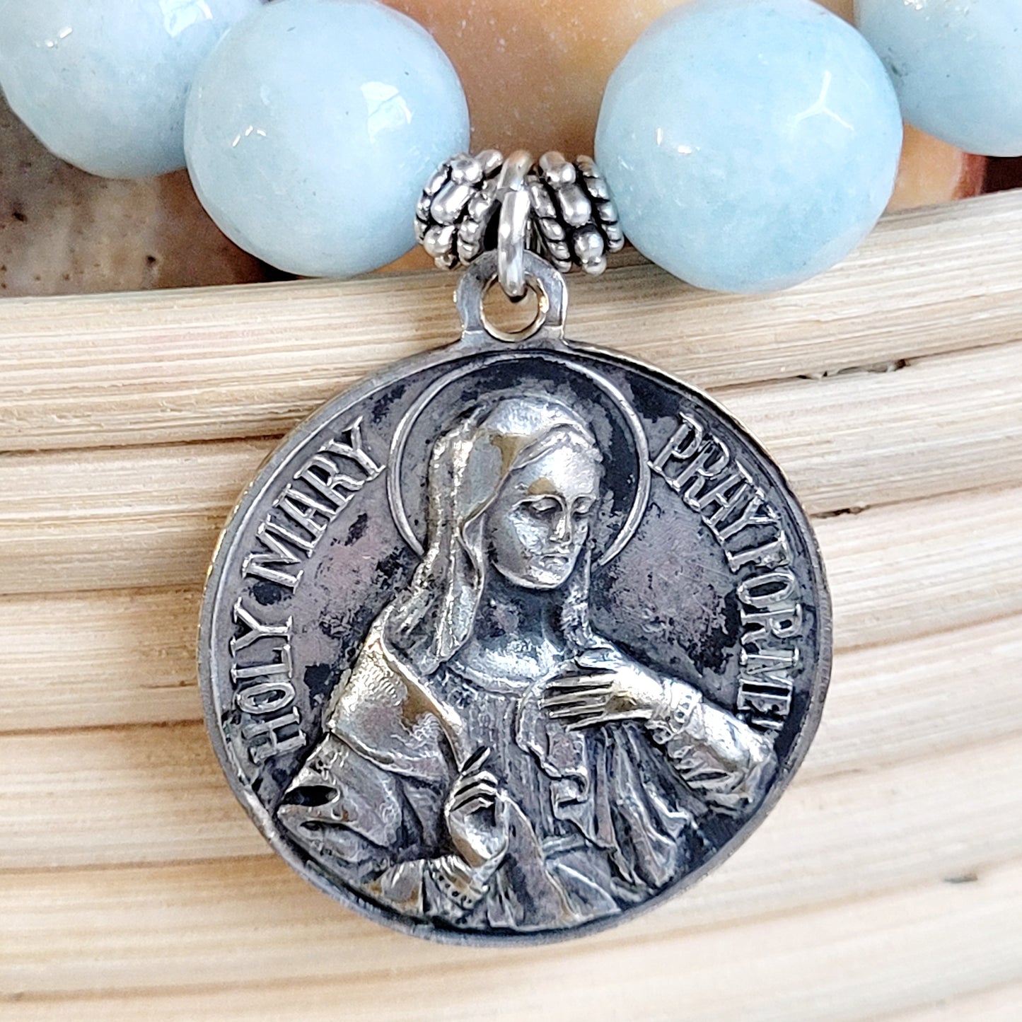 Aquamarine Faceted 12mm Beaded Bracelet w/ Large Deeply Embossed Medal of Jesus Mercy and Mary Pray for Us on the back