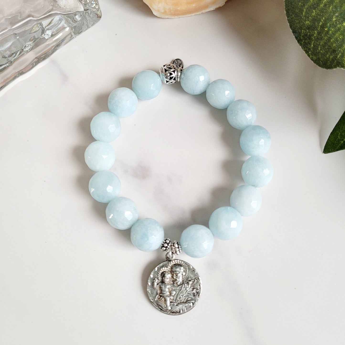 Aquamarine Faceted 12mm Beaded Bracelet w/ Sterling Silver Medal of St. Joseph holding the Child Jesus