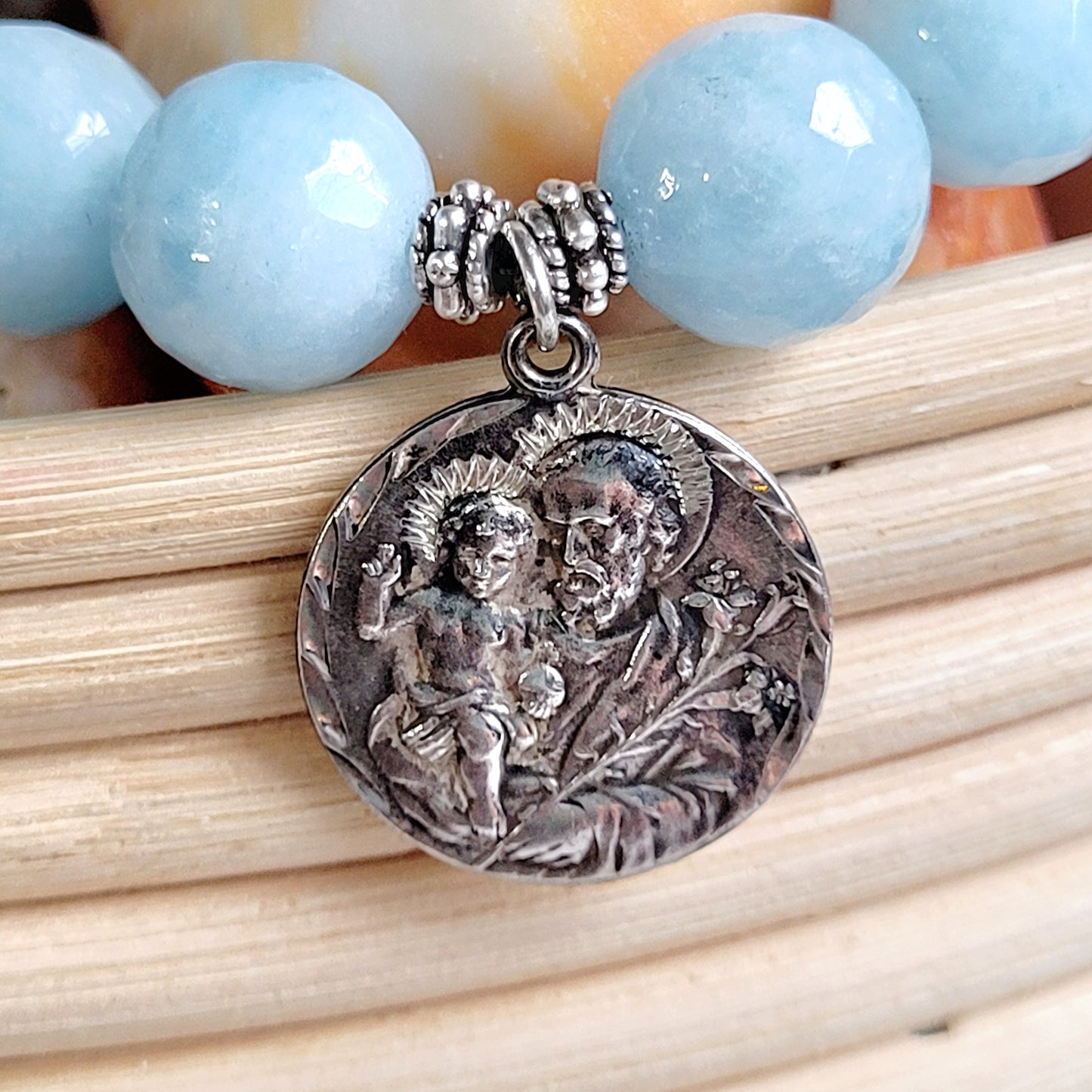 Aquamarine Faceted 12mm Beaded Bracelet w/ Sterling Silver Medal of St. Joseph holding the Child Jesus