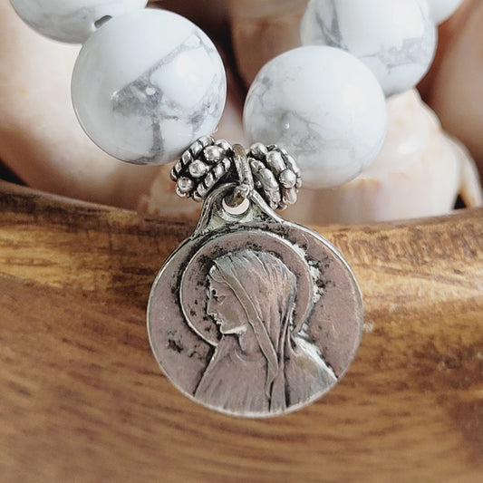 White Howlite 10mm Beaded Bracelet w/ Silver Plated Medal of Our Lady of Lourdes