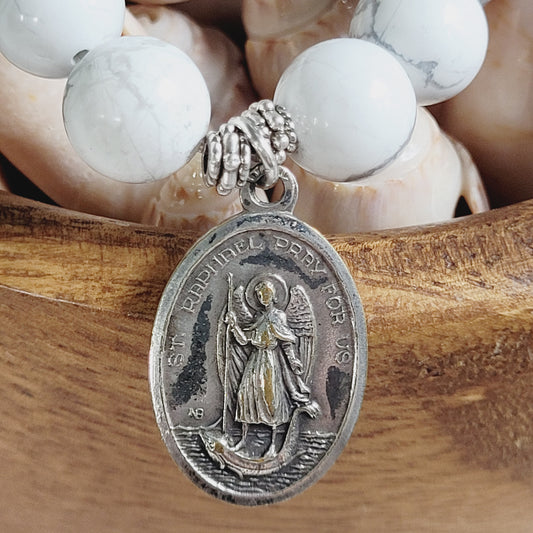 White Howlite 10mm Beaded Bracelet w/ Silver Plated Signed medal of St. Raphael and St. Martin of Porres
