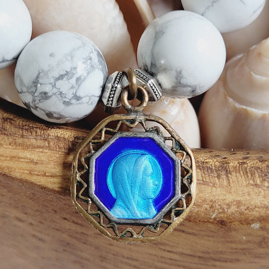 White Howlite 10mm Beaded Bracelet w/ Gold Plated Blue Enameled Medal of Our Lady of Lourdes