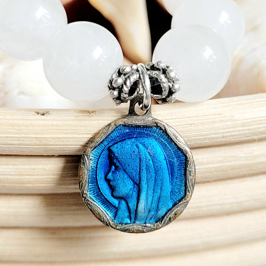 White Jade 10mm Beaded Bracelet w/ Silver Plated Blue Enameled Image of Our Lady of Lourdes