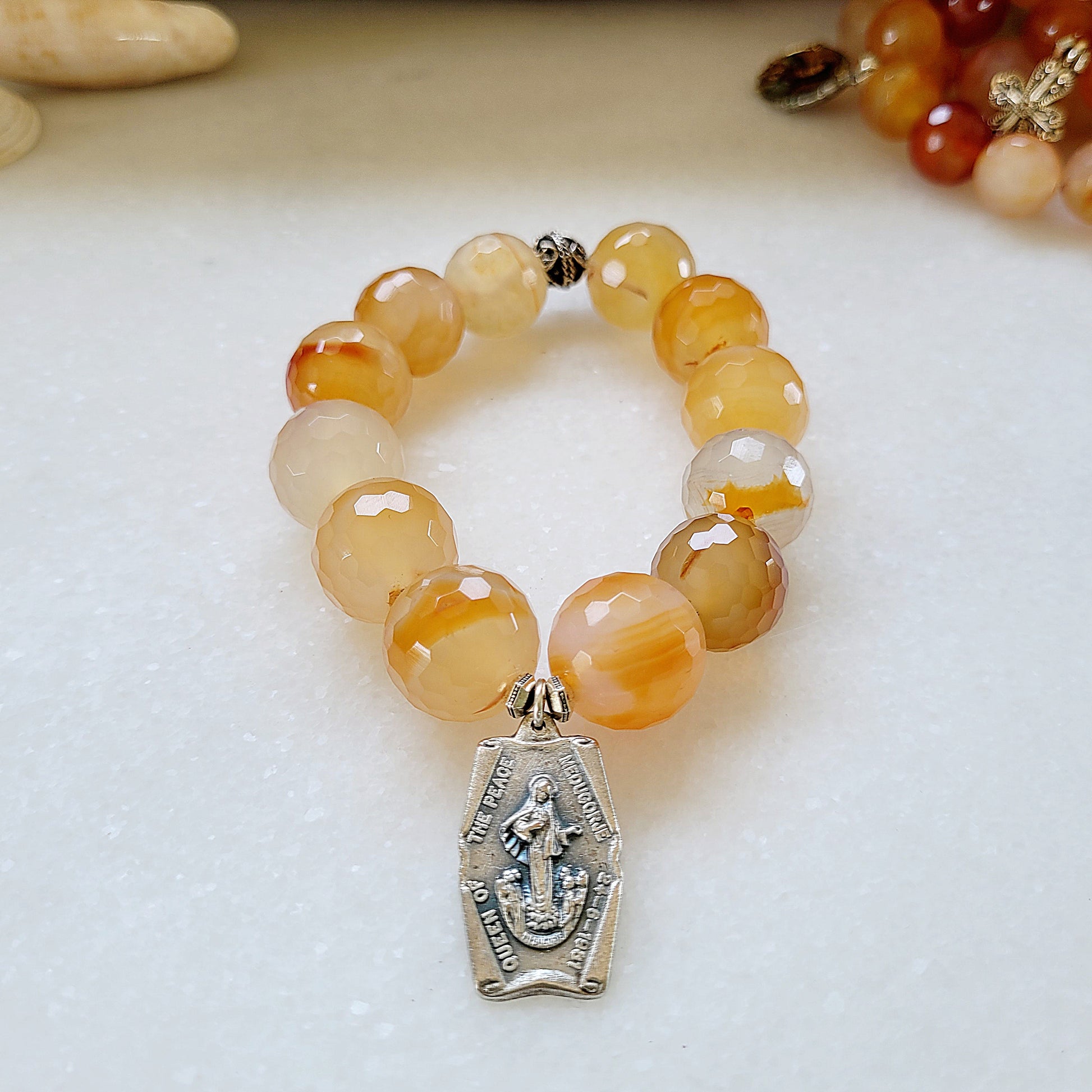 Carnelian Faceted 16mm Beaded Bracelet w/ Our Lady of Medjugorje Dated 1981 St. James Church Silver Medal - Afterlife Jewelry Designs