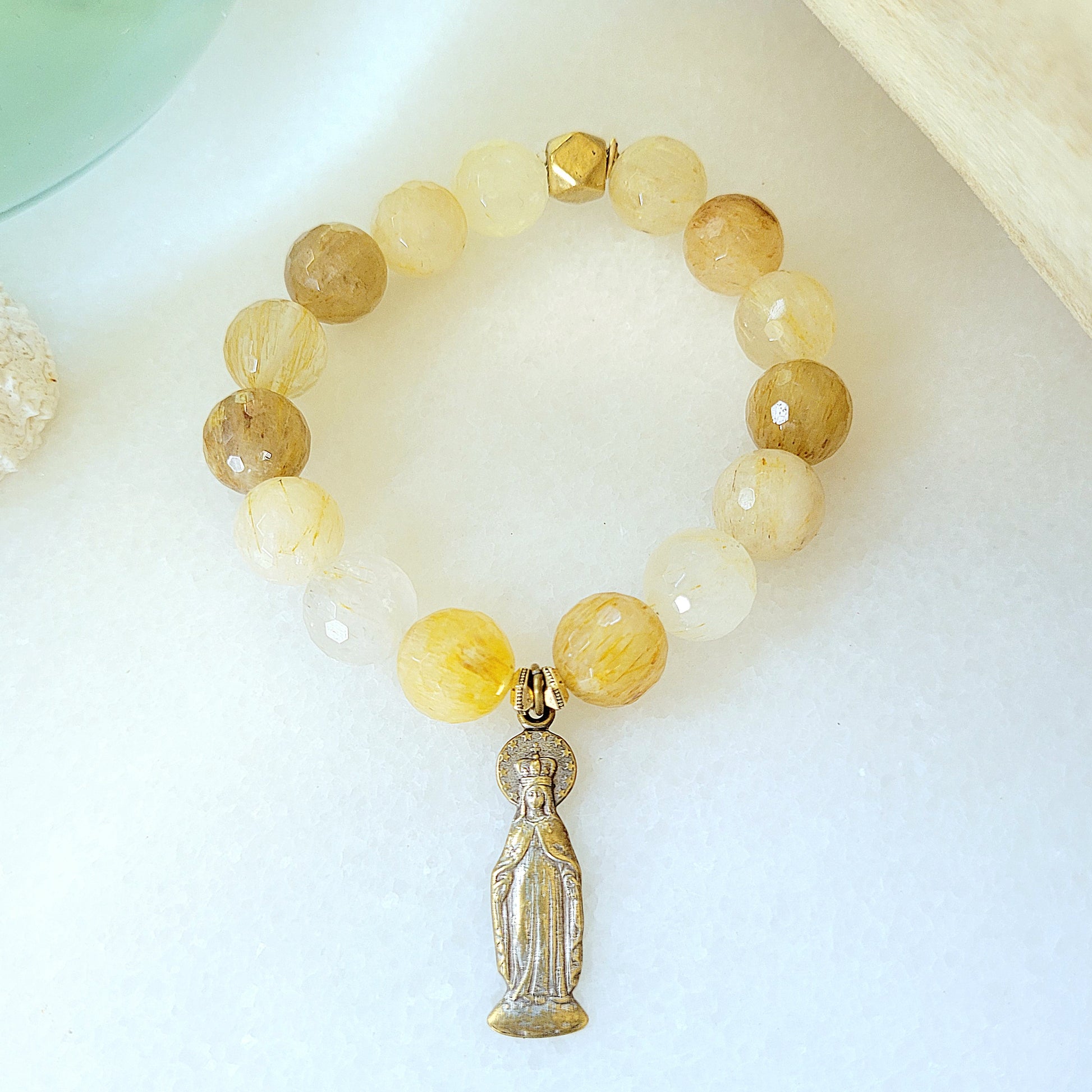 Rutilated Quartz Faceted 12mm Beaded Bracelet w/ Gold-Toned Metal Figure of the Blessed Mother Mary