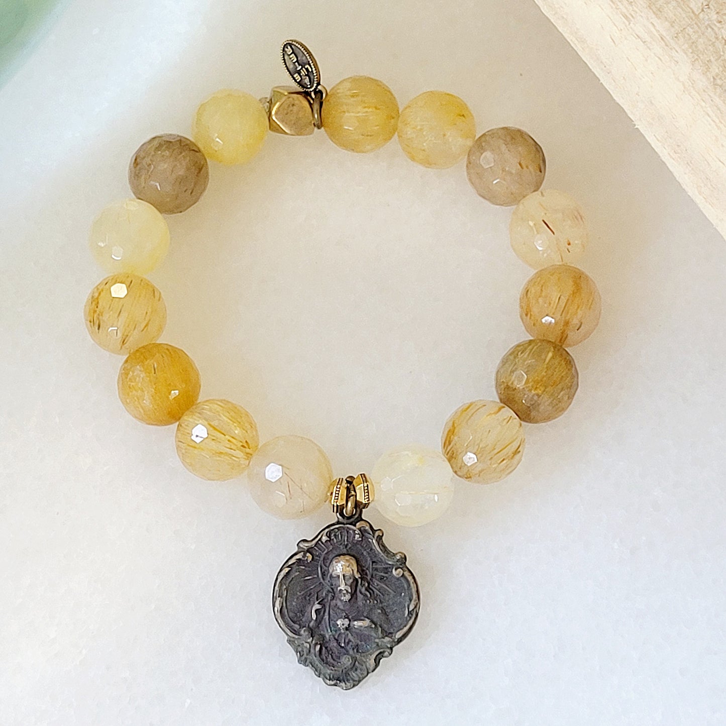 Rutilated Quartz Faceted 12mm Beaded Bracelet w/ Sacred Heart of Jesus / St. Therese of Lisieux Medal