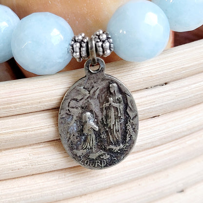 Aquamarine Faceted 12mm Beaded Bracelet w/ Silver Our Lady of Lourdes Medal