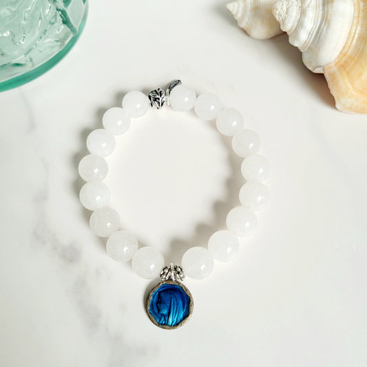White Jade 10mm Beaded Bracelet w/ Silver Plated Blue Enameled Image of Our Lady of Lourdes